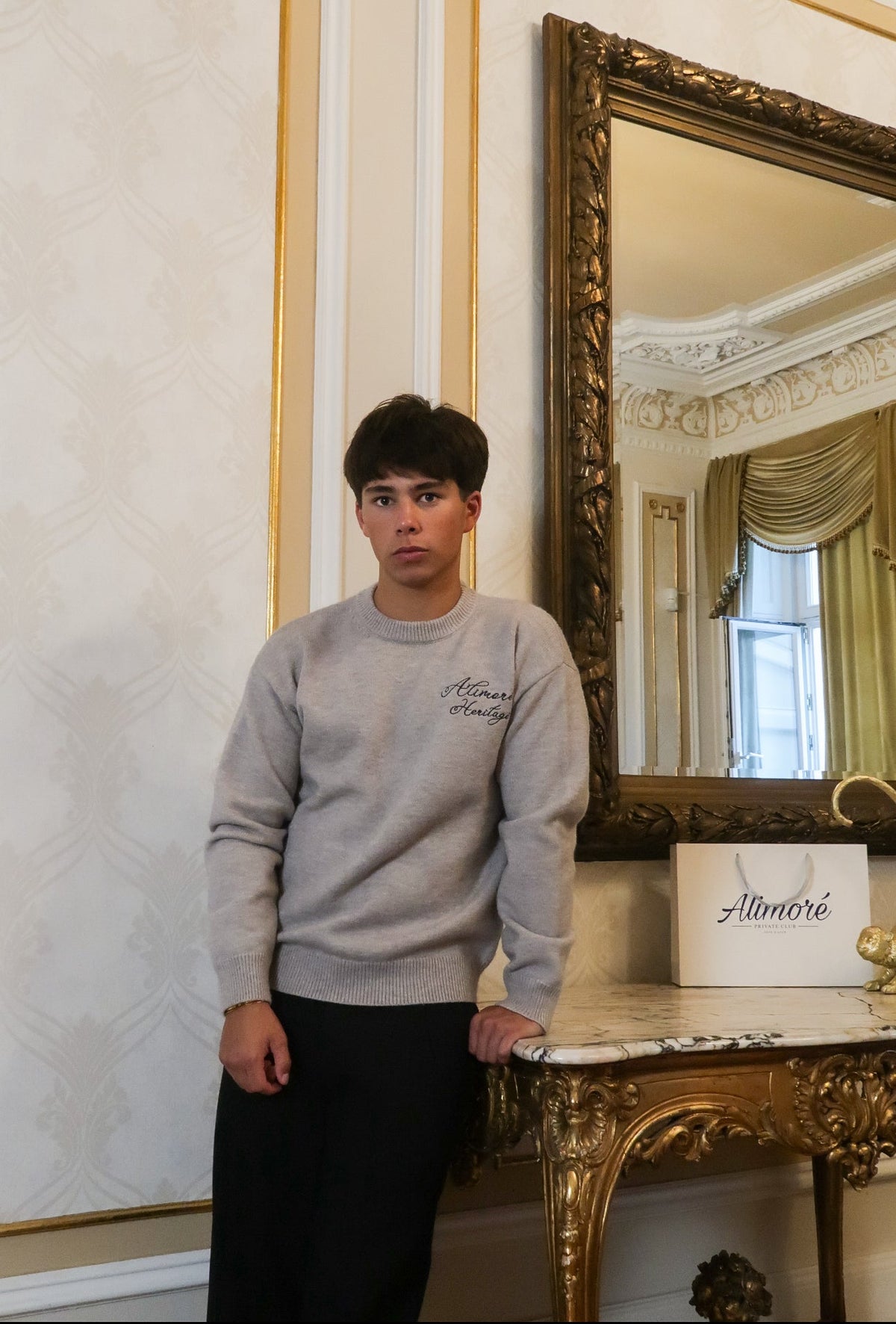 SWEATERS